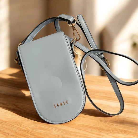 NWOT Light Blue Crossbody Bag with bag charm - Picture 2 of 11